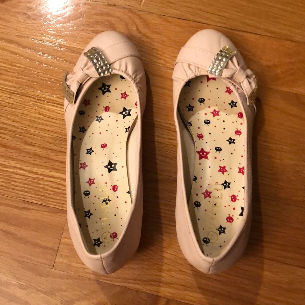 Pink heels with rhinestone bow